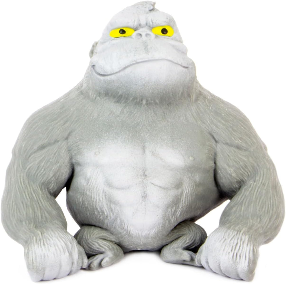Plush toy of a gray creature with yellow eyes on a white background