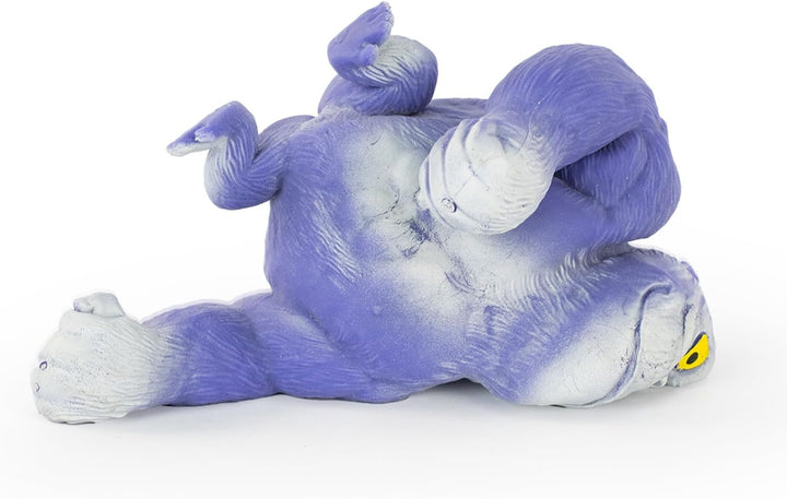 Purple and gray plush toy on a white background